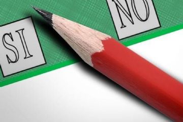 Nell'immagine sono rappresentati due riquadri con le deciture SI, NO ed una matita di colore rosso